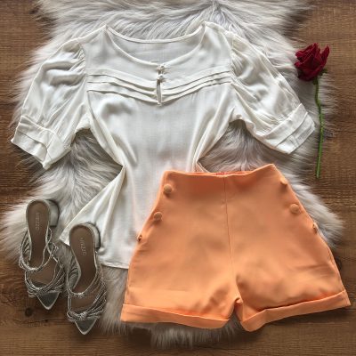 BLUSA PREGAS NO PEITO